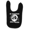 my dachshund rides shotgun Baby Bibs