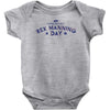 rex manning day Baby Onesie