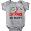 legends are born september Baby Bodysuit