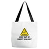 keep out of direct sunlight Tote Bags