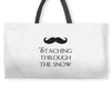 staching through the snow Weekender Totes