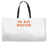 on day release Weekender Totes