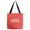 evolution of a zombie Tote Bags