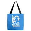 a woman's place is in the resistance Tote Bags