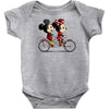 biking down main street Baby Bodysuit