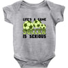 life's a game soccer Baby Onesie
