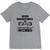 never underestimate an old man who was born in december V-Neck Tee