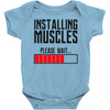 new installing muscle Baby Onesie
