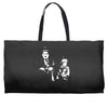 charlie chaplin the kid Weekender Totes
