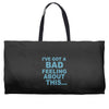 bad feeling Weekender Totes