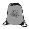 life is a beautiful ride Drawstring Bags
