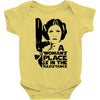 a woman's place is in the resistance Baby Bodysuit