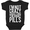 i'm not crazy cause i take the right pills Baby Bodysuit