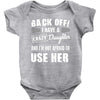 back off i have a crazy daughter and i'm not afraid to user her. Baby Onesie