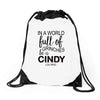 in a world full of grinches be a cindy lou who Drawstring Bags