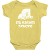 still plays with trucks Baby Onesie