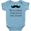 staching through the snow Baby Onesie