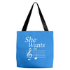 she wants the d black Tote Bags