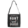 i have two titles aunt and dogmom and i rock them both Adjustable Strap Totes