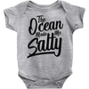 the ocean made me salty Baby Onesie