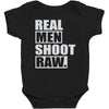 real men shoot raw Baby Bodysuit