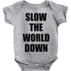 slow the world down Baby Onesie