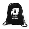 i want to believe Drawstring Bags