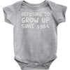 refusing to grow up since 1984 Baby Onesie