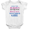 don't be jealous just because i'm a super cute november girl Baby Bodysuit
