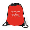 the tree isn't the only getting lit this christmas Drawstring Bags