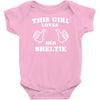 this girl loves her sheltie Baby Onesie