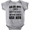 back off i have a crazy mommy and i'm not afraid to user her Baby Onesie