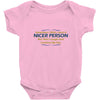 nicer person Baby Onesie