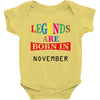 legends are born november Baby Bodysuit