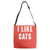 i like cats Adjustable Strap Totes