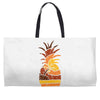 pineapple and beach Weekender Totes