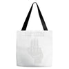 read between the lines Tote Bags