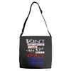 she is a crazy nurse Adjustable Strap Totes