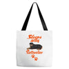 Sleeps With Rottweiler Tote Bags