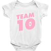 team 10 light pink Baby Onesie