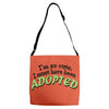 im so cute i must have been adopted Adjustable Strap Totes