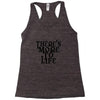 there's more to life Racerback Tank