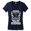 Never Underestimate Dog Rescuer Who Was Born November Women's V-Neck T-Shirt