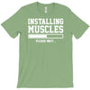 installing muscles funny T-Shirt