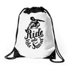 ride into the sunset Drawstring Bags