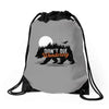 Don't Die Wondering Drawstring Bags