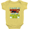 mommy's looks daddy's gas Baby Onesie