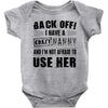 back off i have a crazy nanny and i'm not afraid to user her Baby Onesie