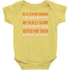 be a strong woman for halloween! Baby Bodysuit