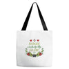 home is where the guac is Tote Bags